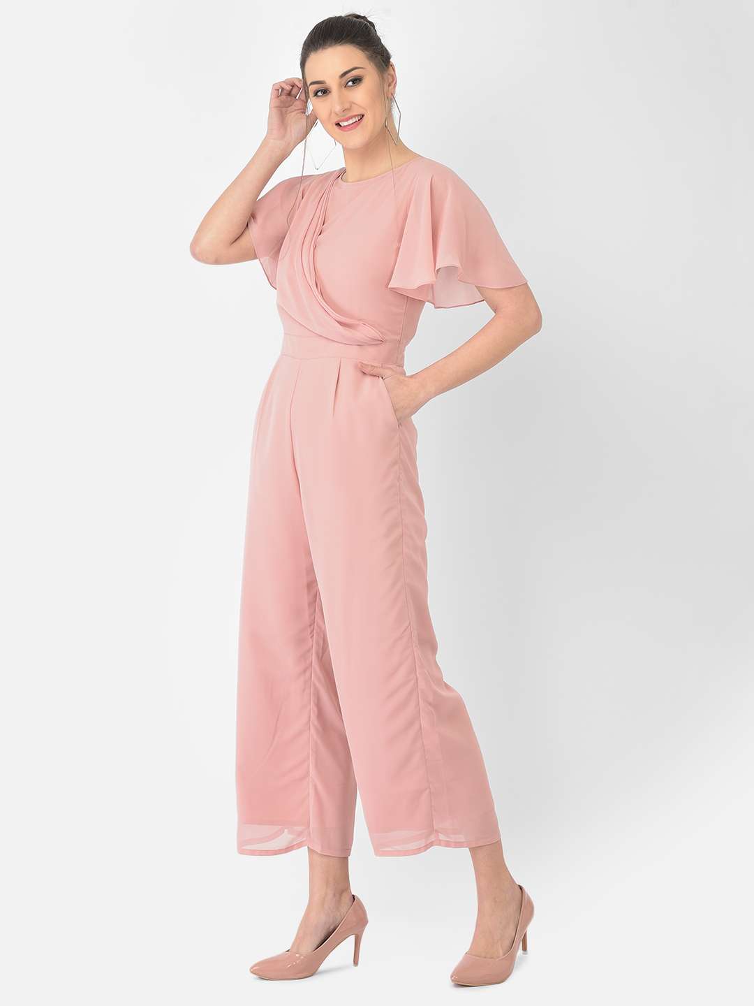 A Pink Corduroy Jumpsuit Styled With White Boots - Not Dressed As Lamb